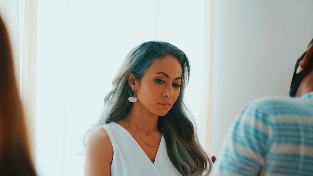 woman in white tank top