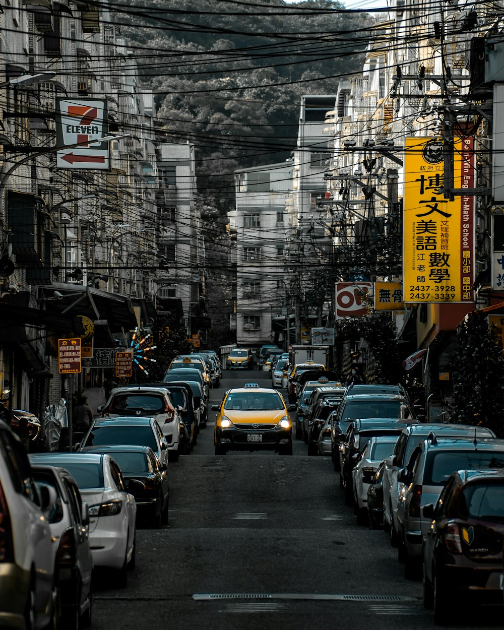 cars parked on the side of the road during daytime