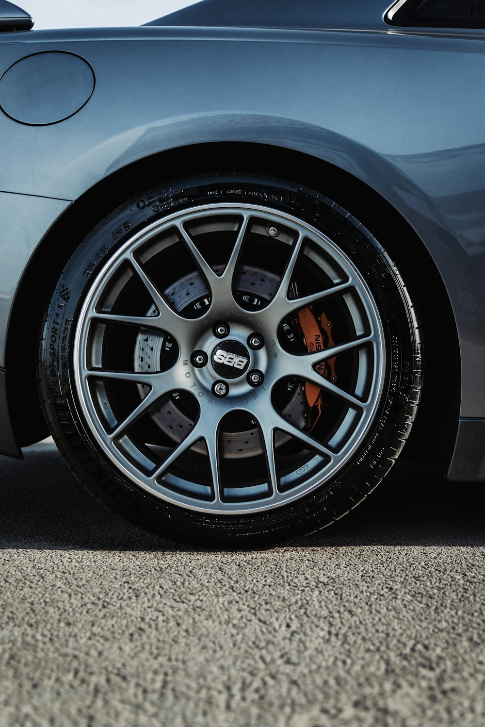 silver and black car wheel