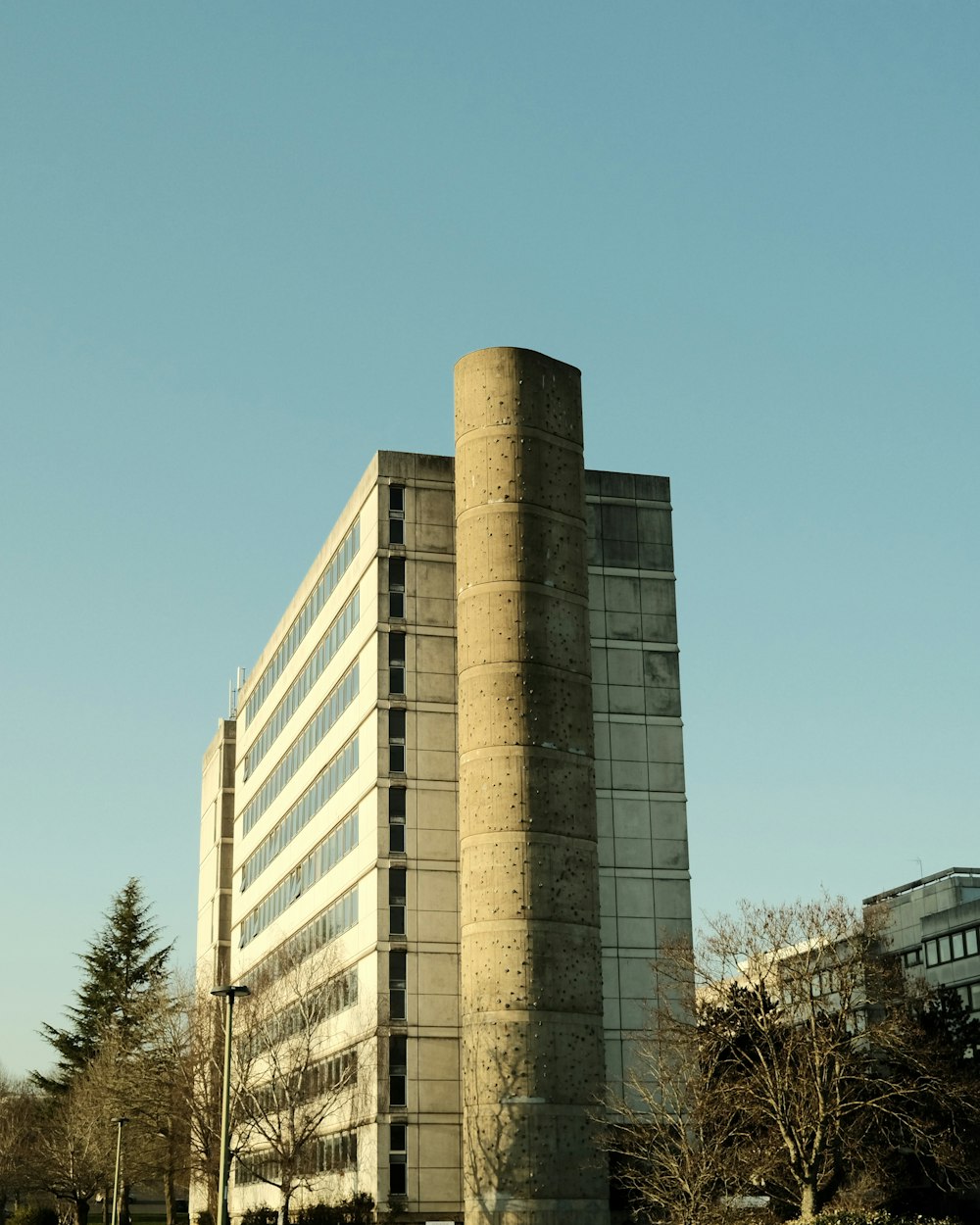 white concrete building under blue sky during daytime