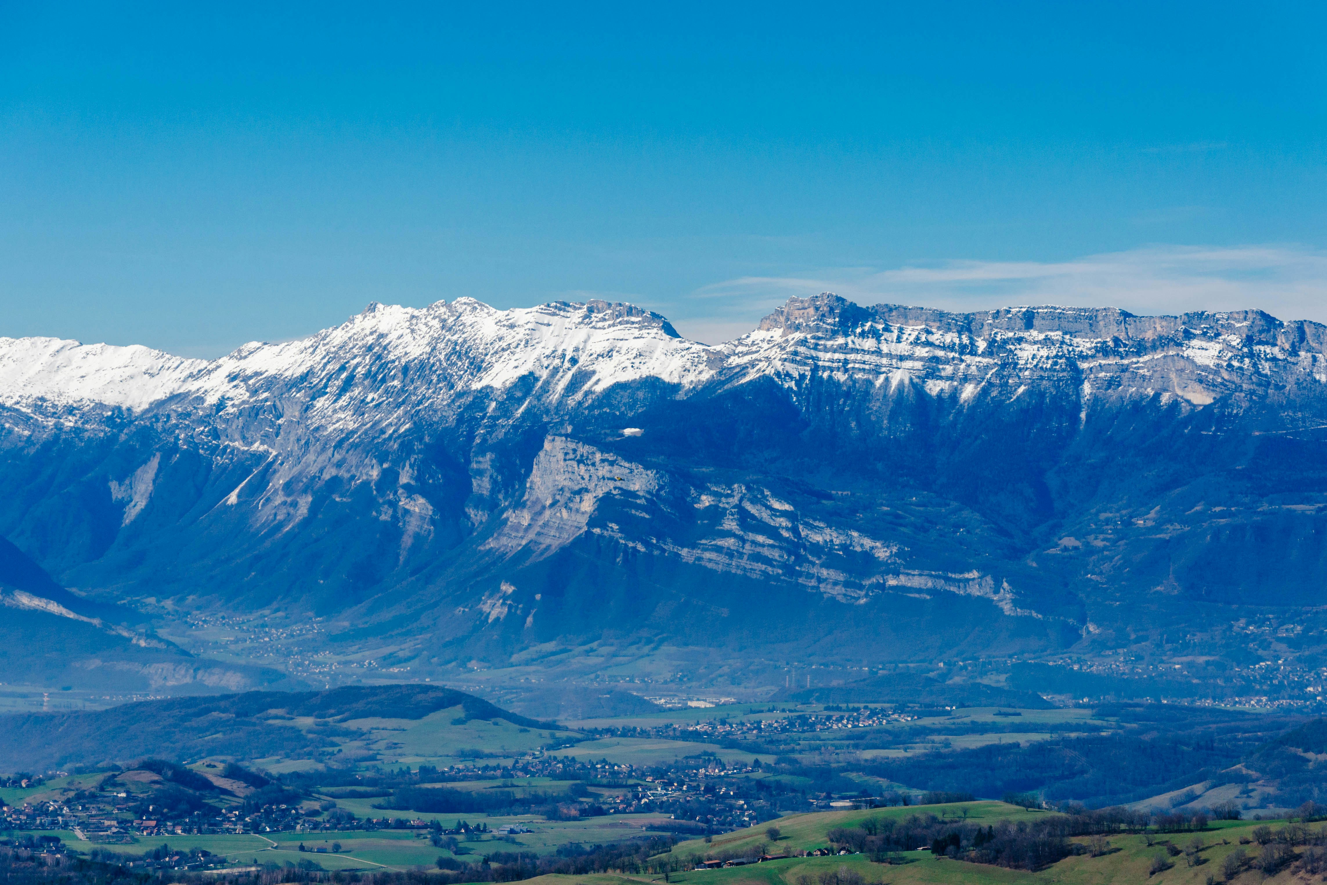 snow covered mountain under blue sky during daytime