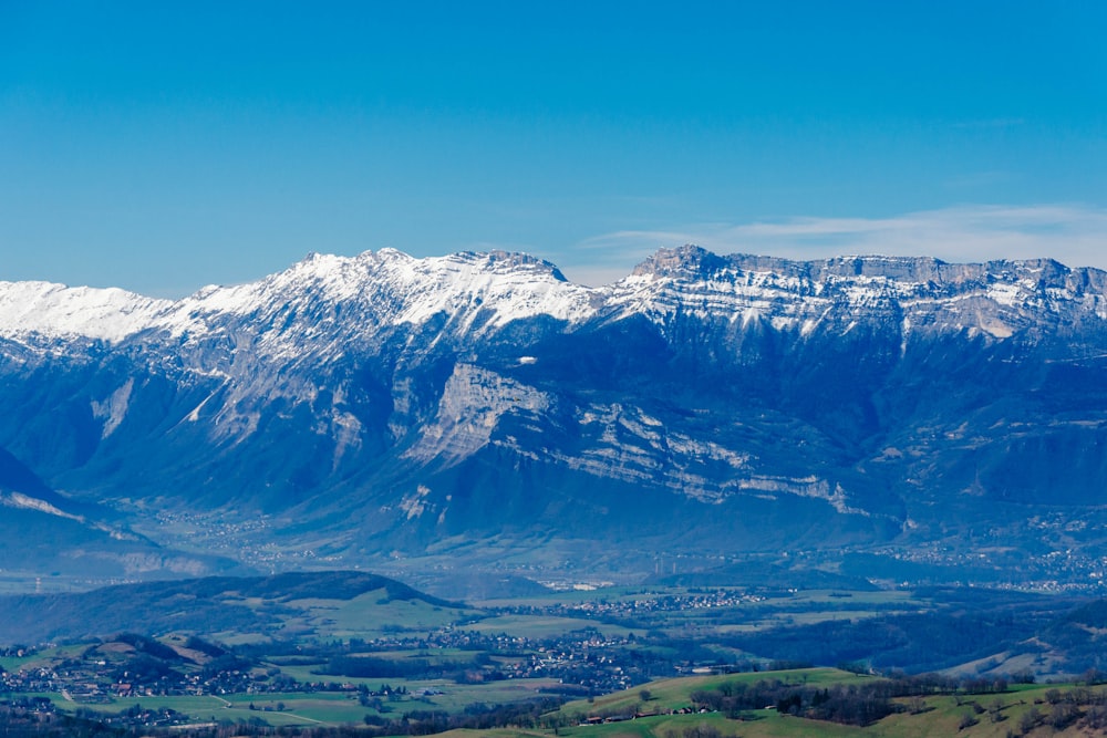 snow covered mountain under blue sky during daytime