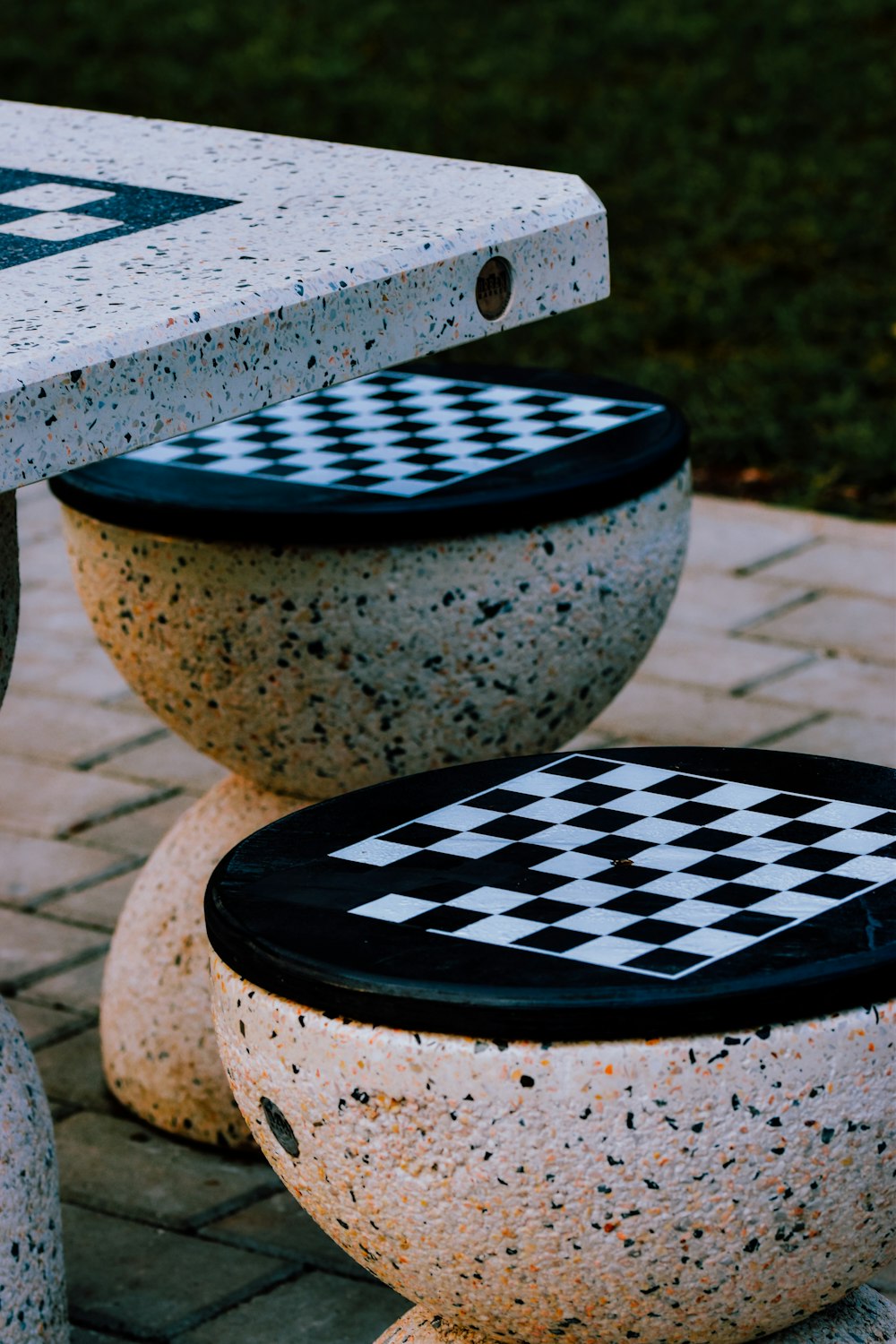 white and black round concrete table