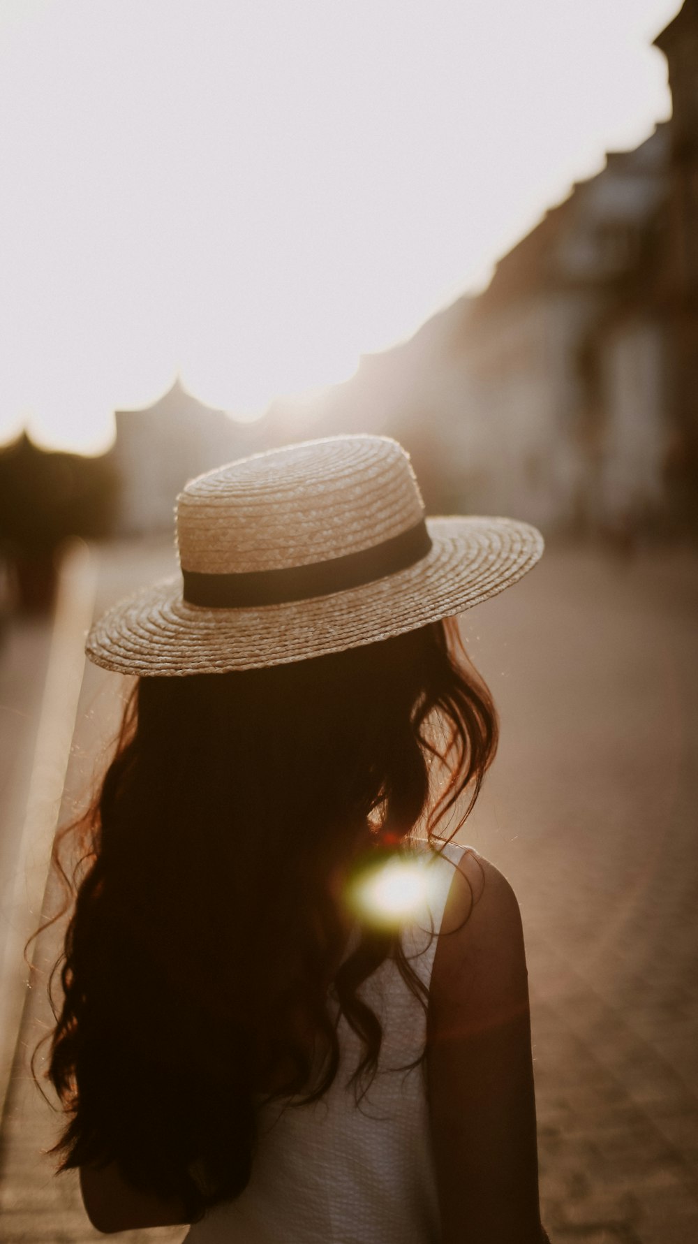 woman wearing brown sun hat during daytime
