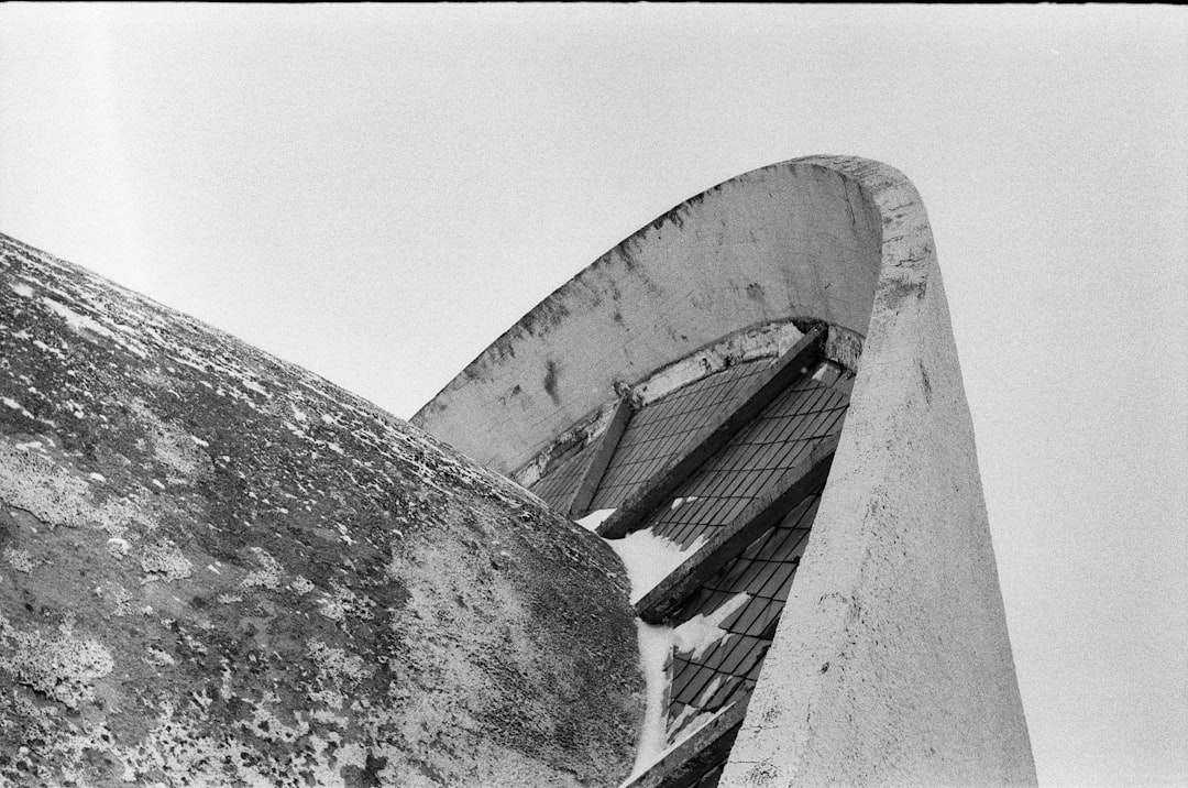 grayscale photo of concrete building