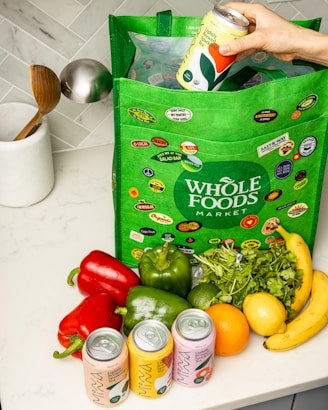 yellow banana fruit on green plastic pack