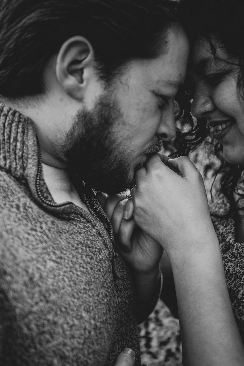 man kissing womans cheek