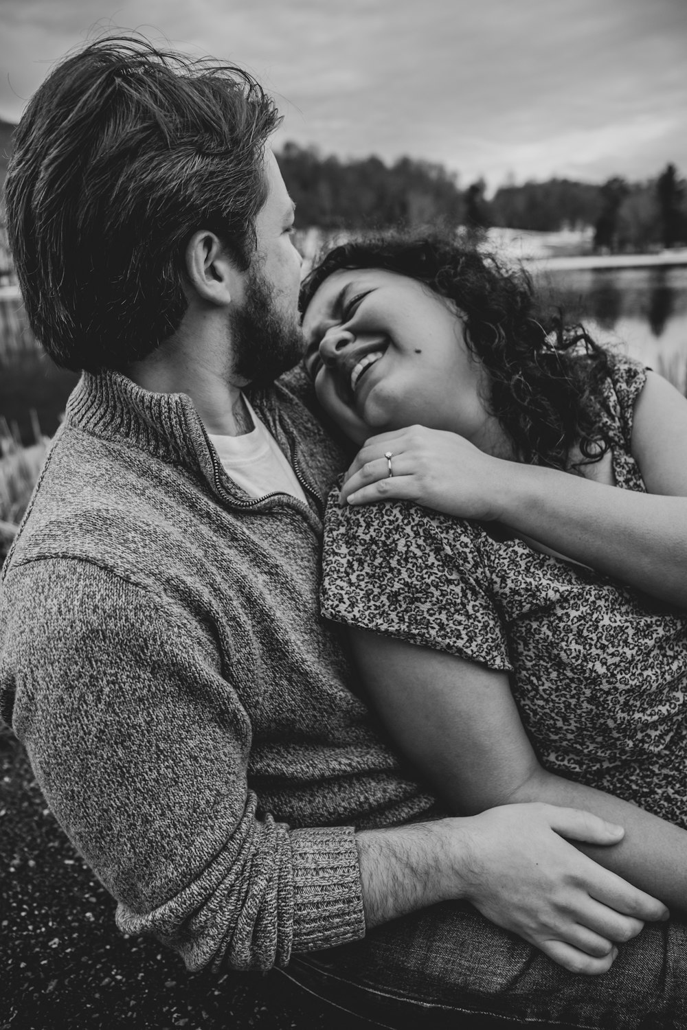 grayscale photo of couple kissing