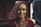 Photo of a cheerful Indian woman in her 40s, symbolizing a grateful client from Mumbai.