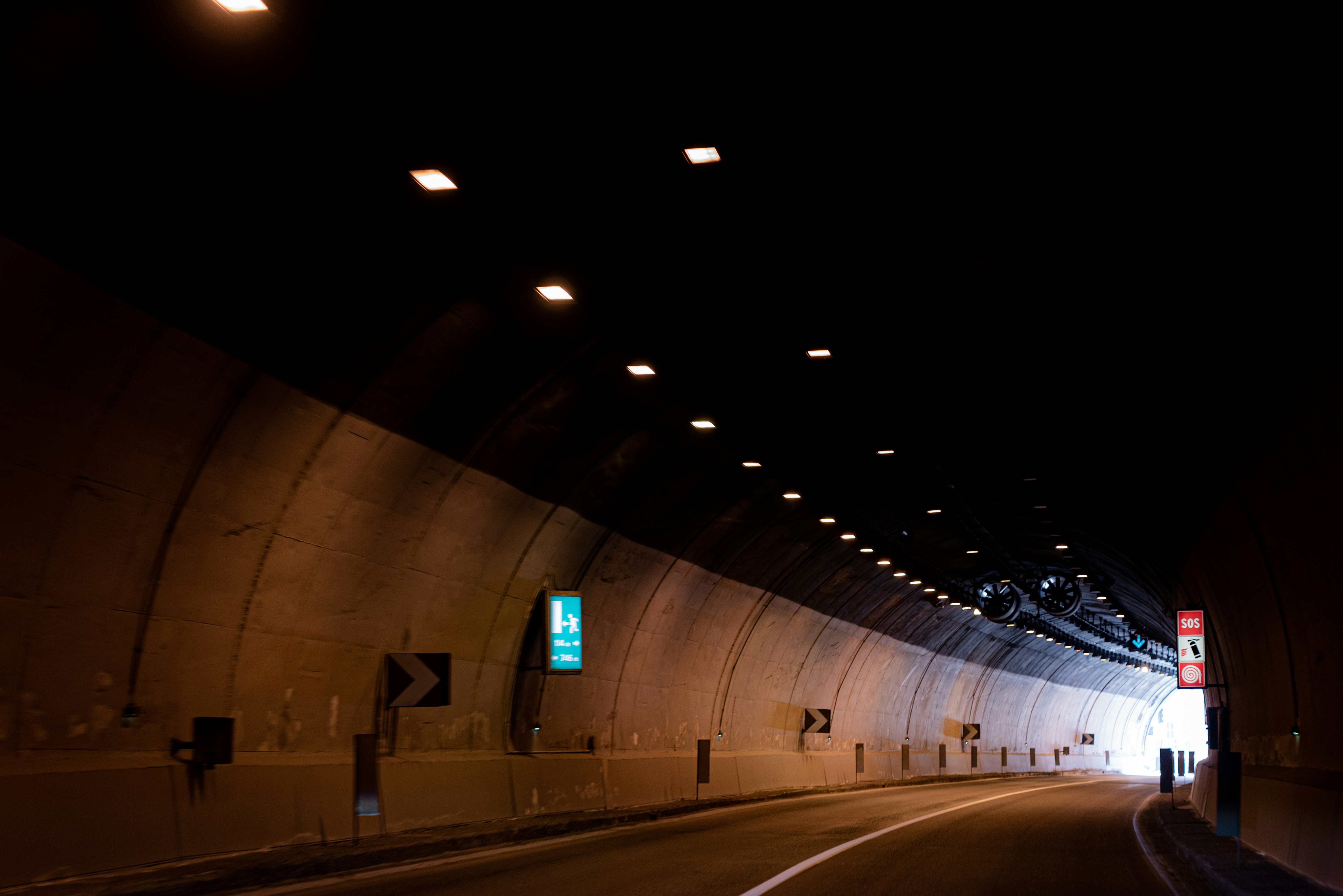 white car on road during night time