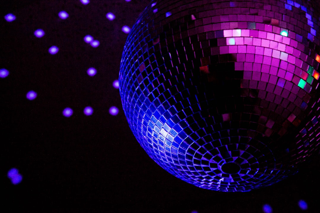 purple and blue ball with light,