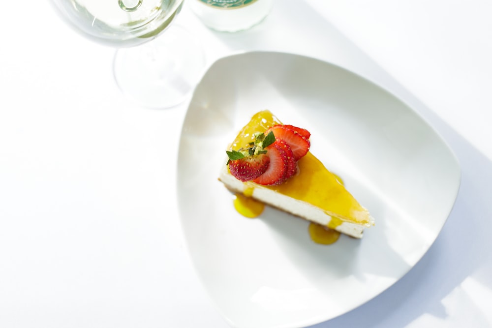 sliced fruit on white ceramic plate