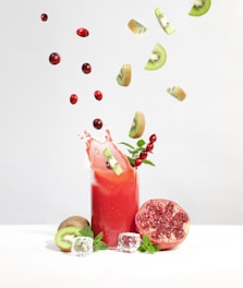 strawberry juice in clear drinking glass