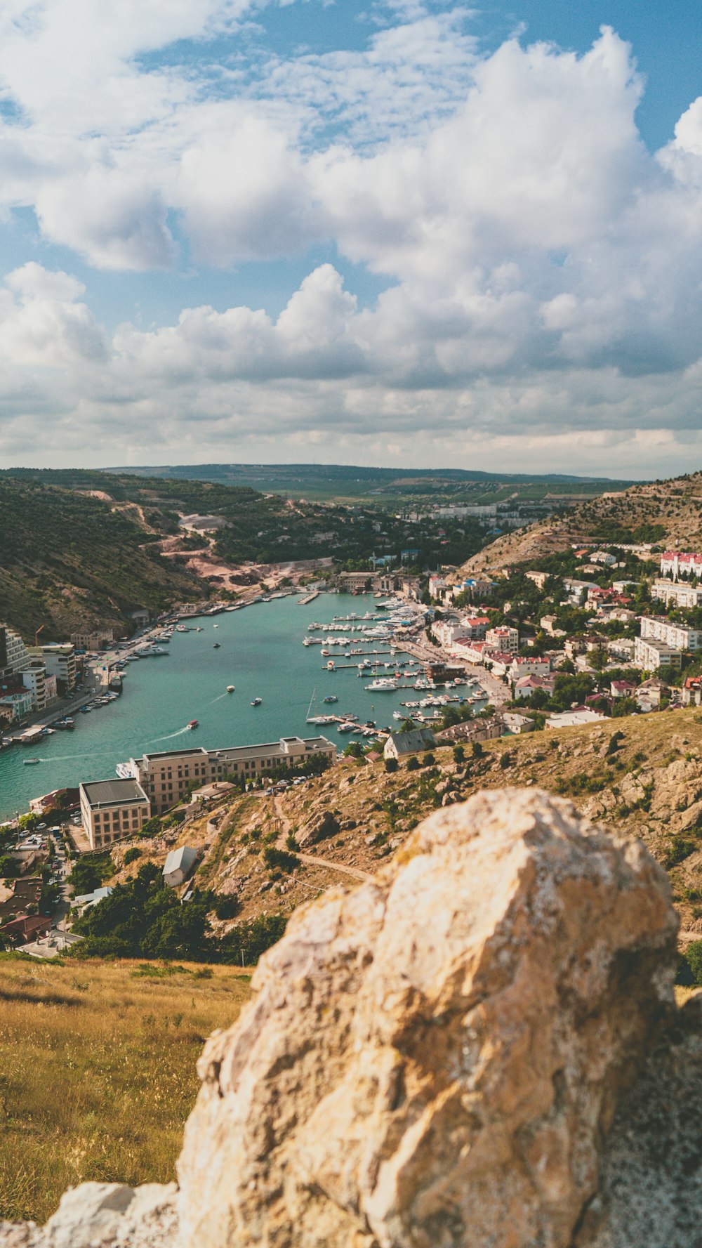 aerial view of city near body of water during daytime