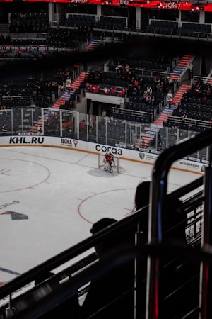 Youth and amateur hockey game inside an indoor arena, representing the year-round youth, adult, and semi-pro use the city requires