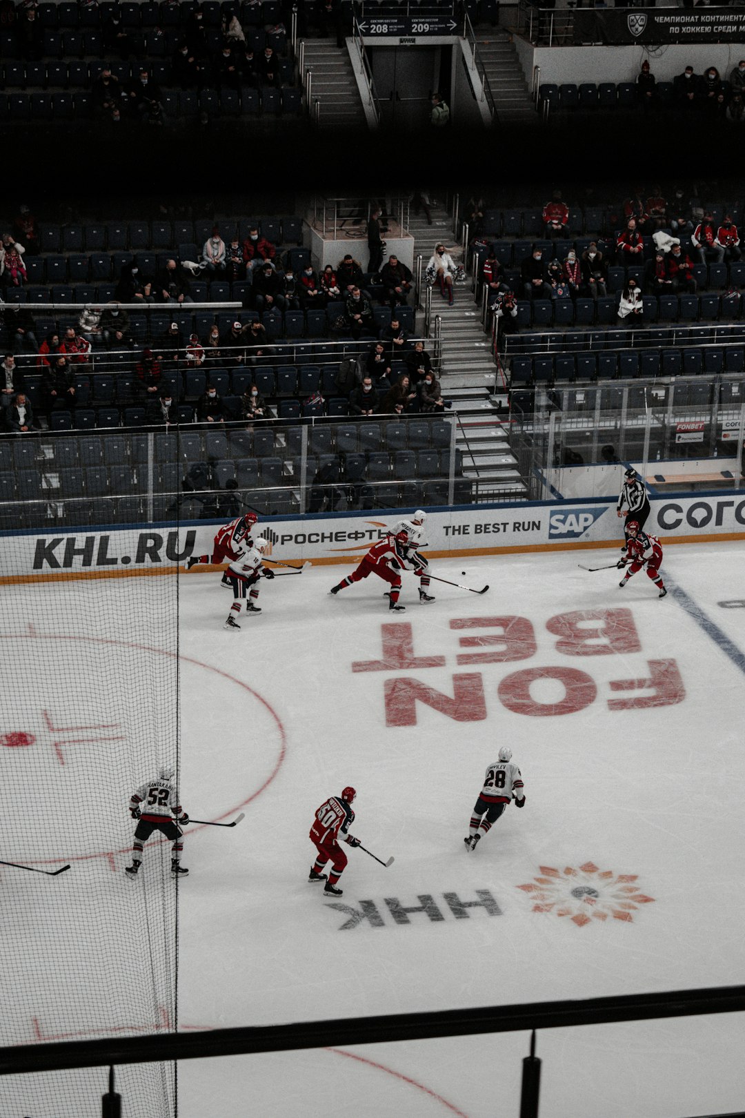 people playing ice hockey on field