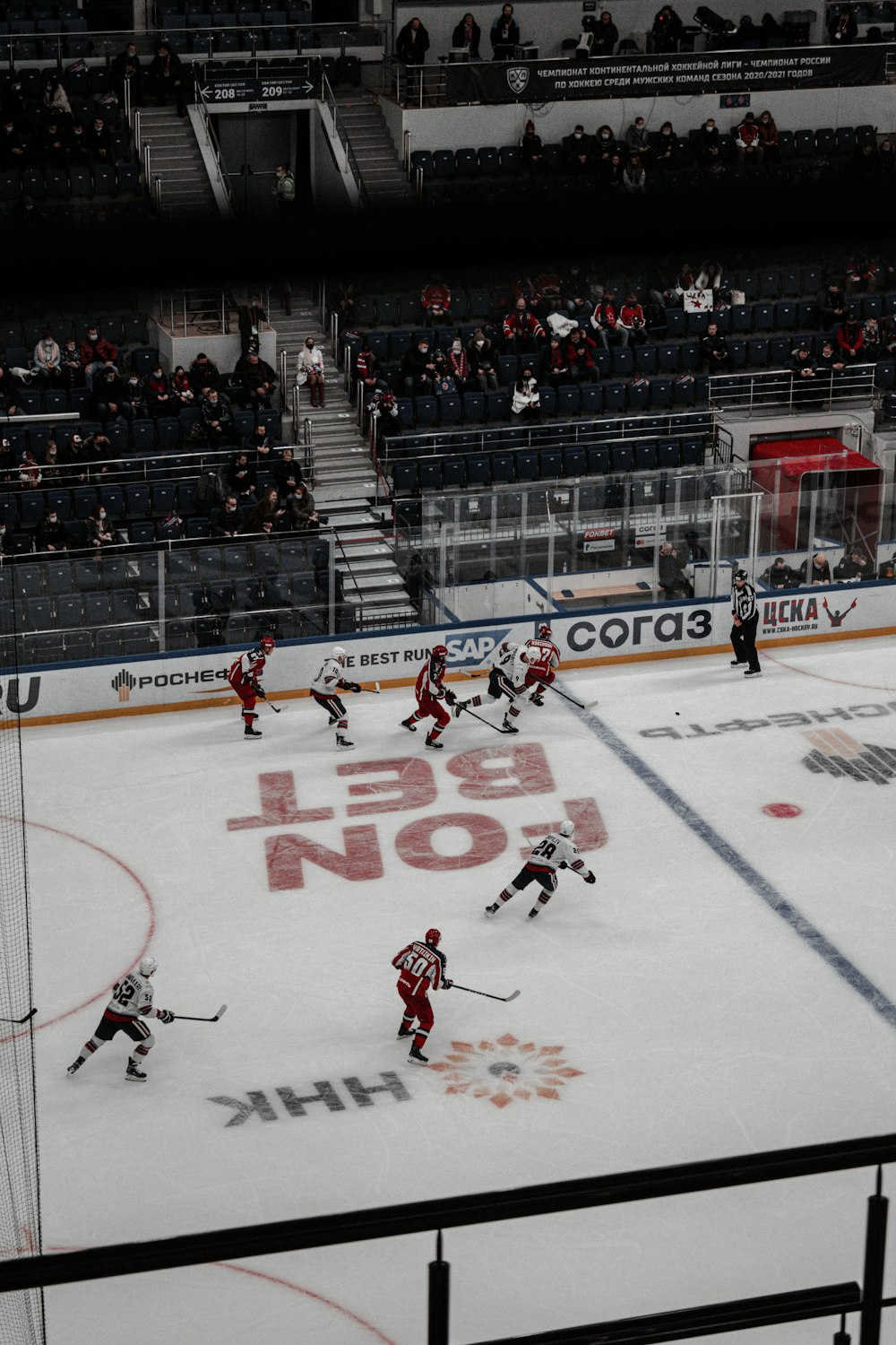 ice hockey players on ice hockey field