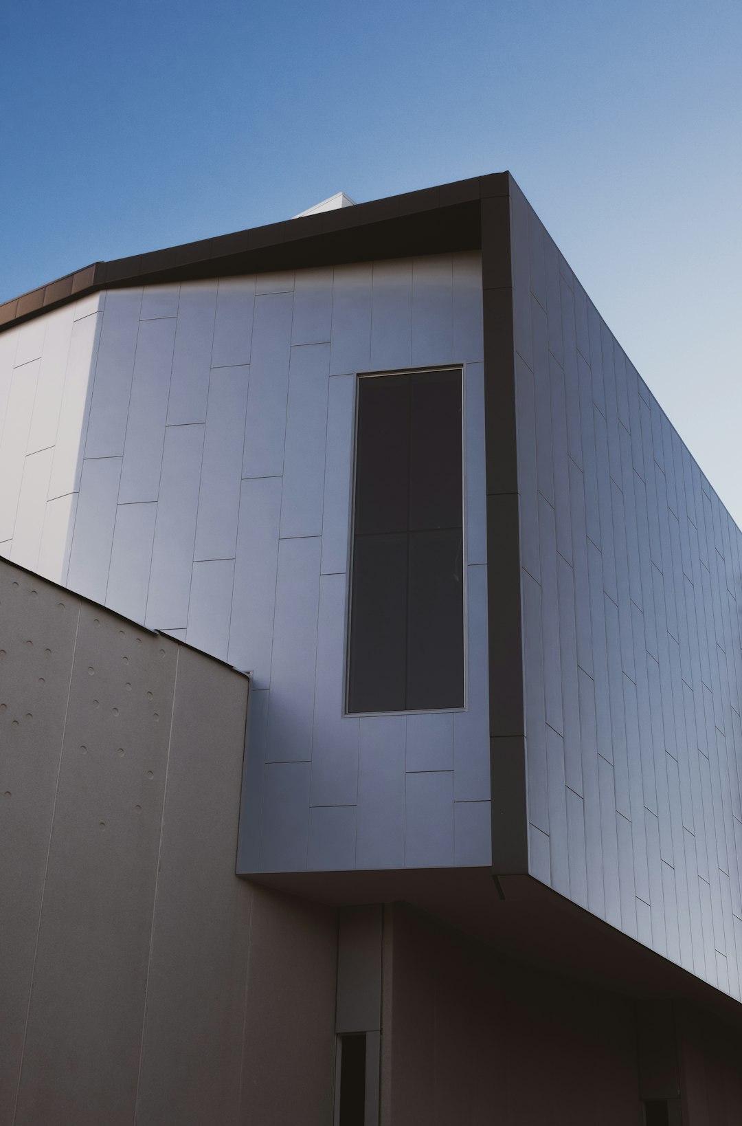 white concrete building under blue sky during daytime