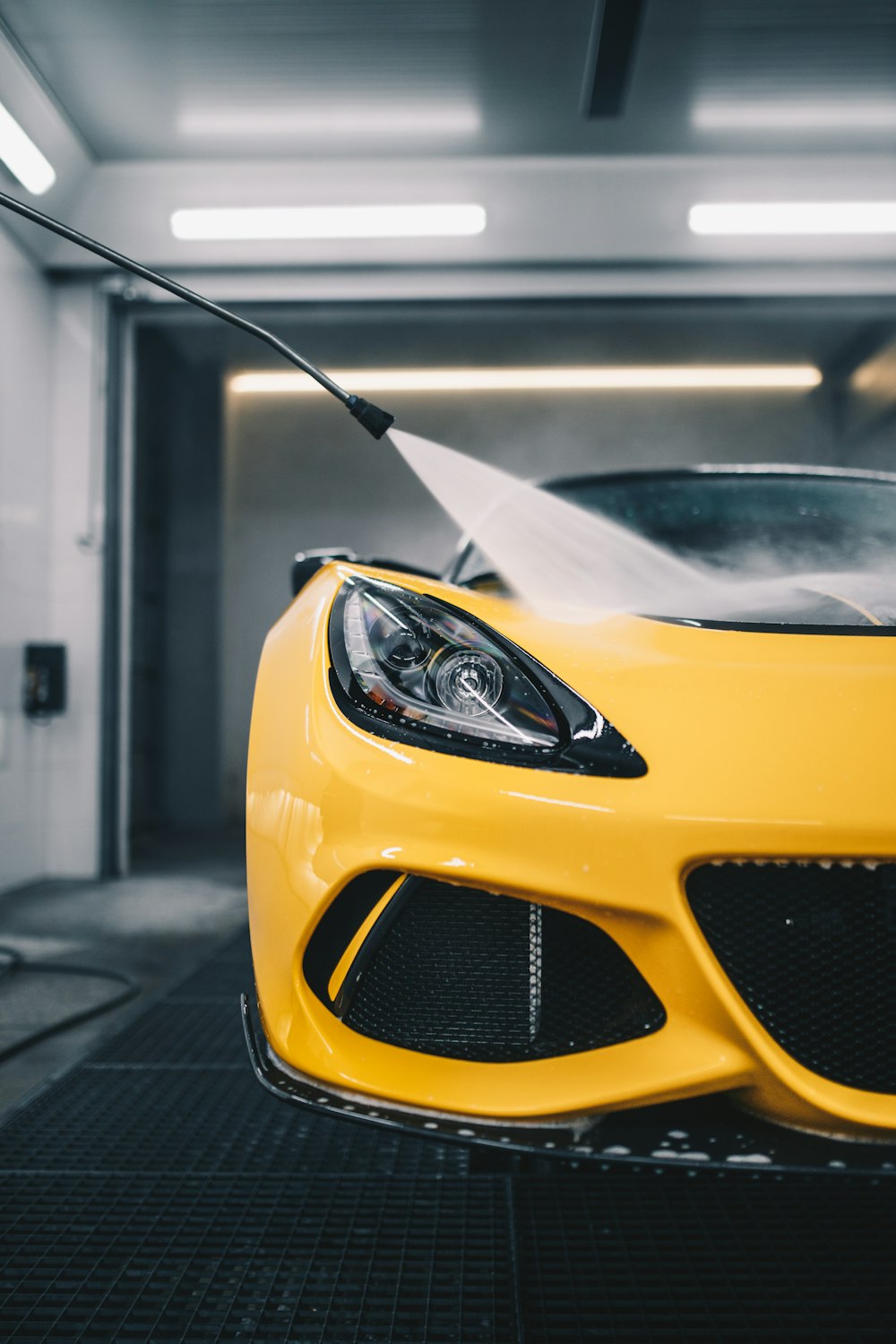 yellow lamborghini aventador parked on parking lot