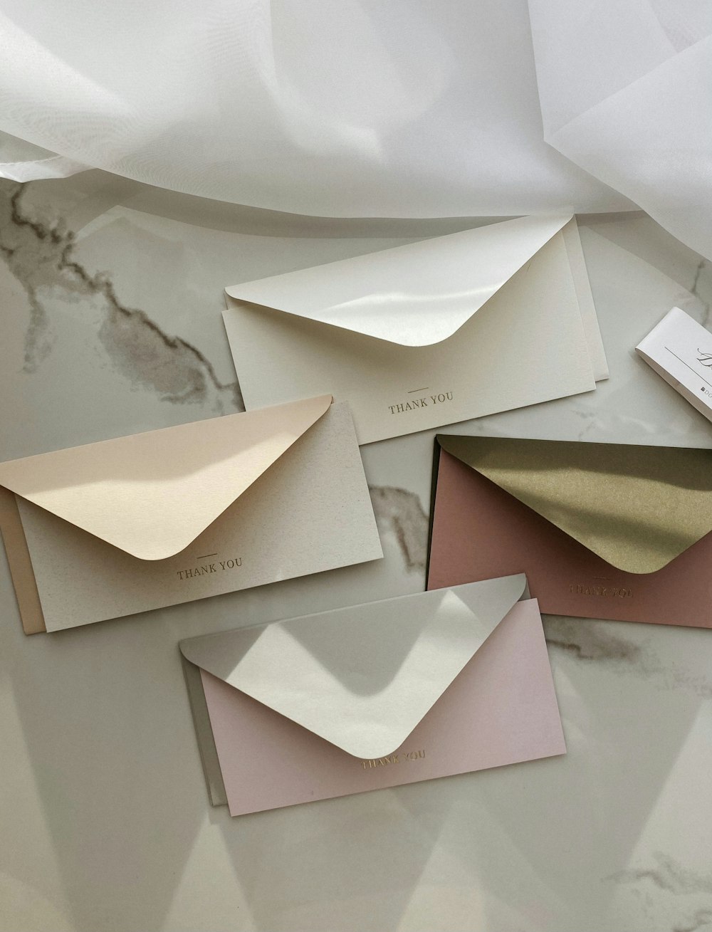 white and brown greeting cards