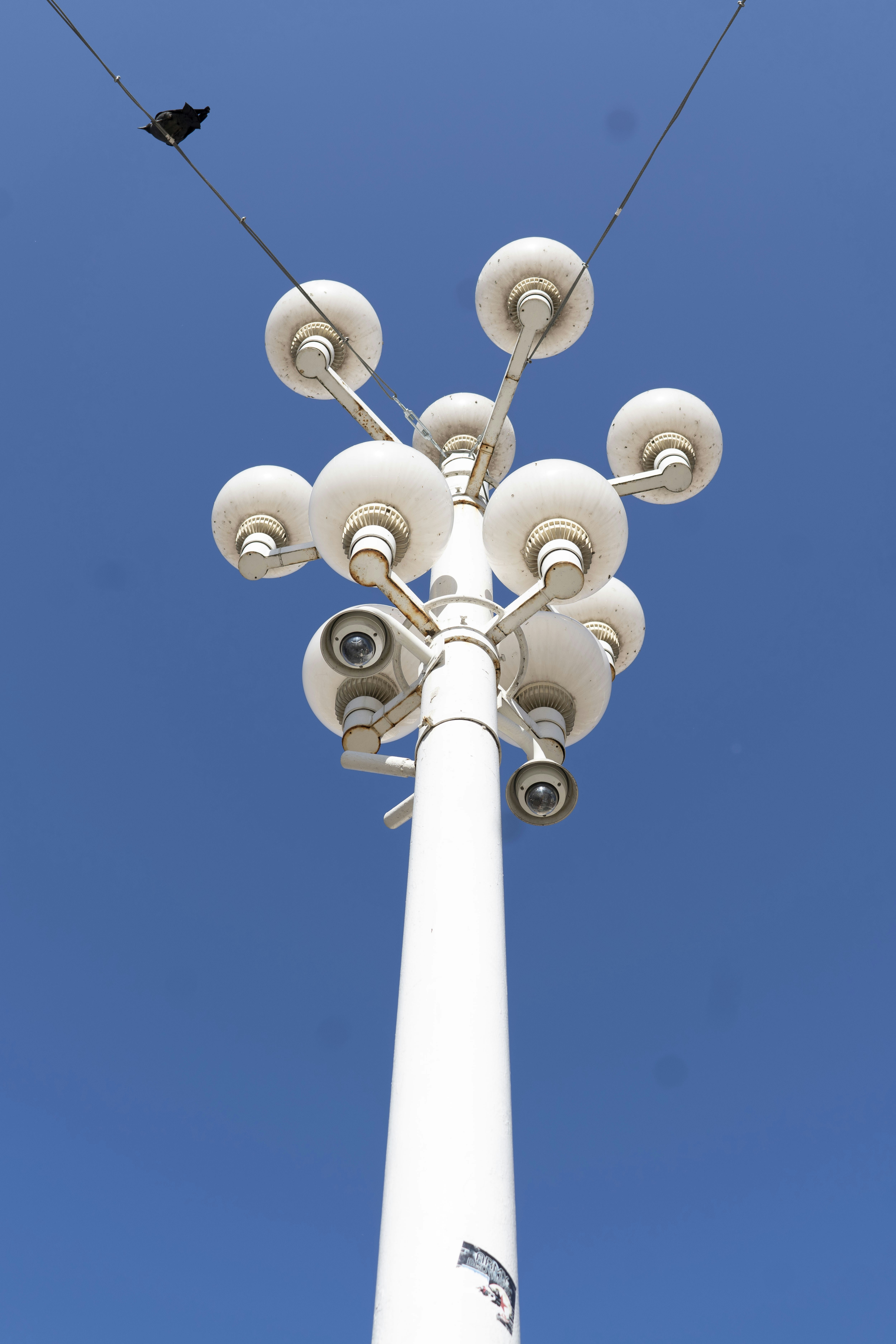 white concrete tower under blue sky during daytime