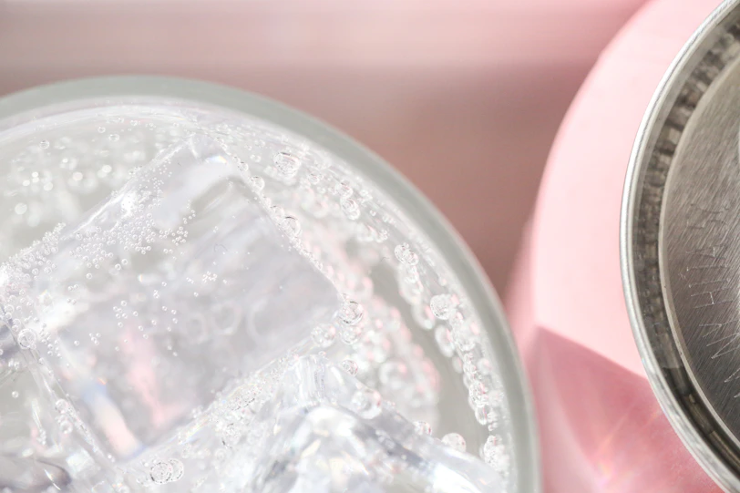 clear plastic container with white powder