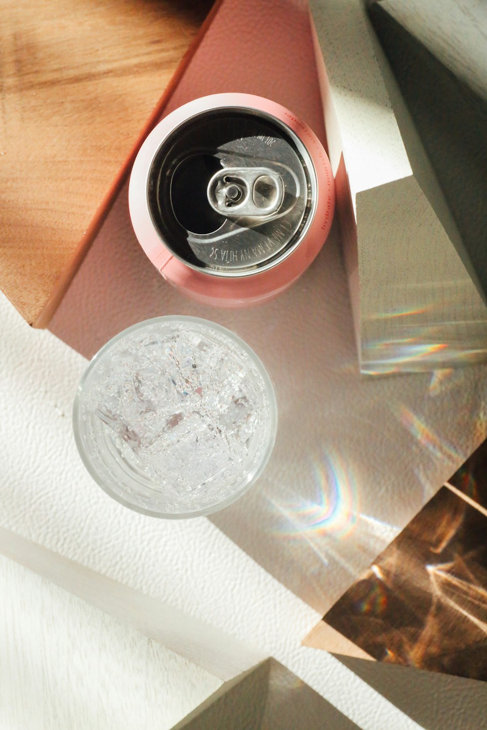 clear glass round lid on brown wooden table