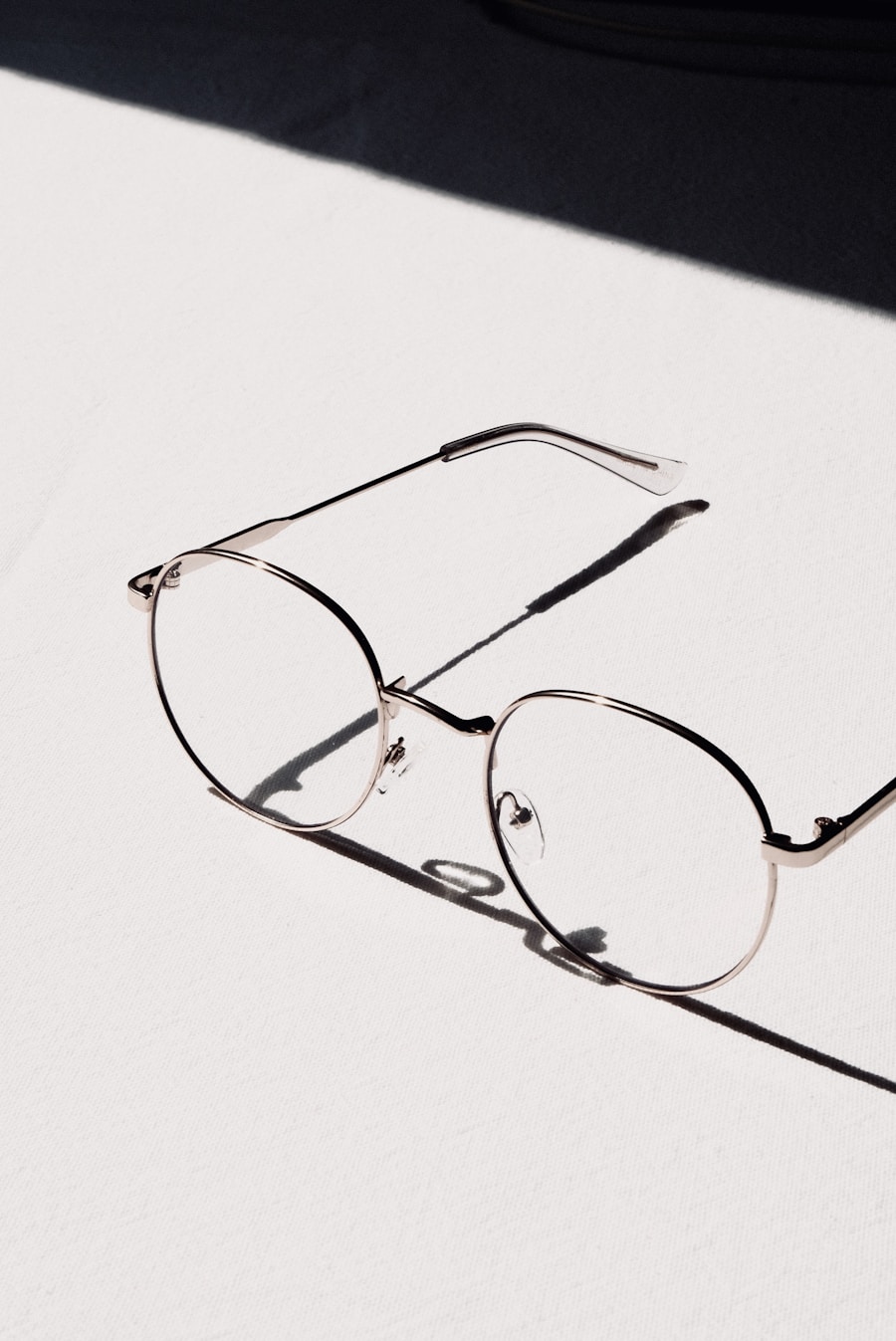 Luxury designer eyewear frames displayed on a minimalist surface