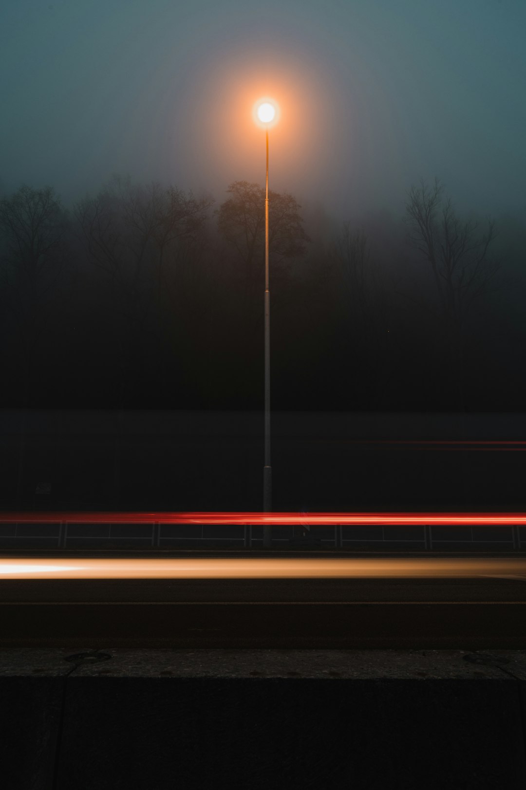 time lapse photography of street lights during night time