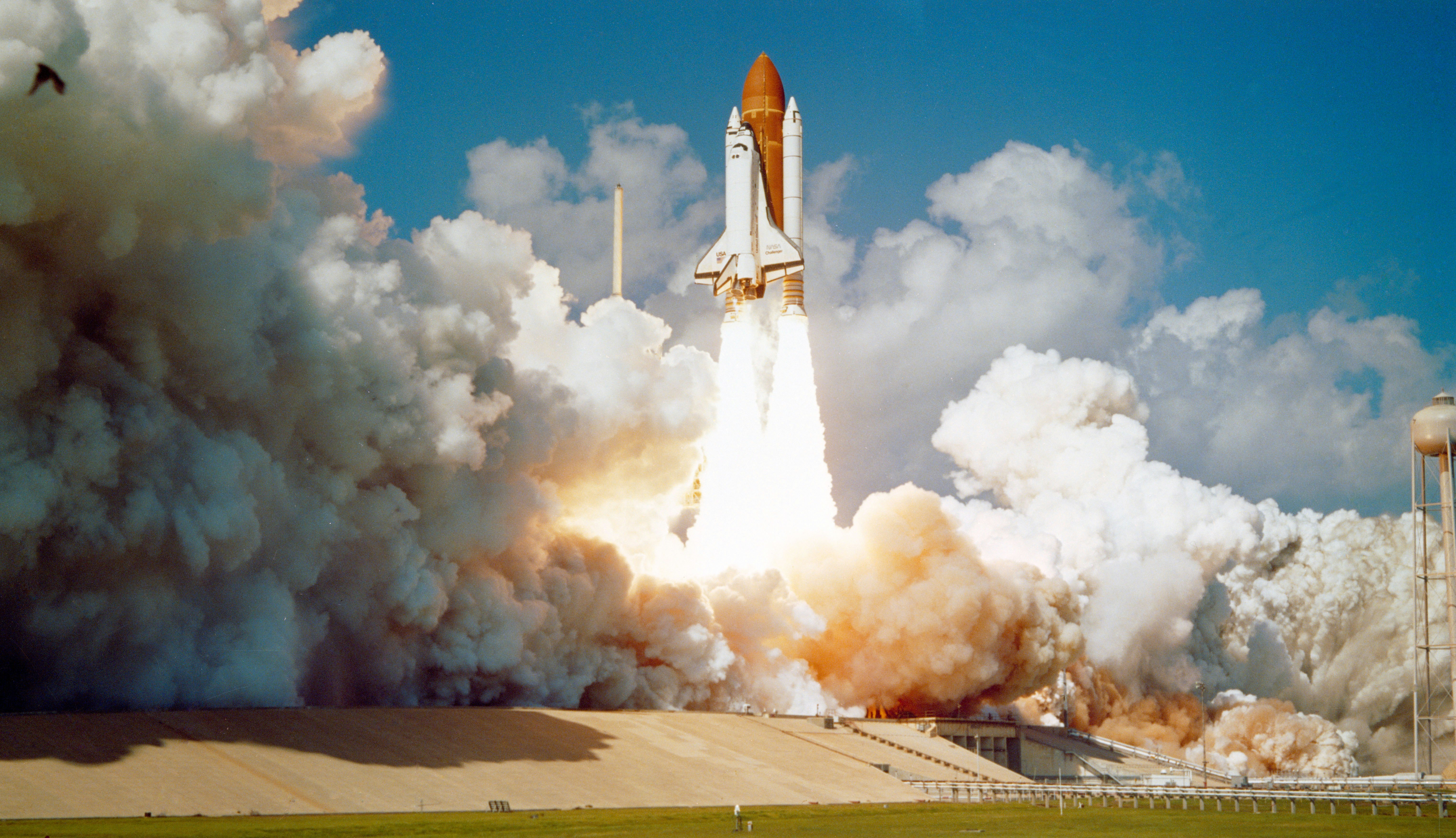 The Space Shuttle Challenger launching from Complex 39