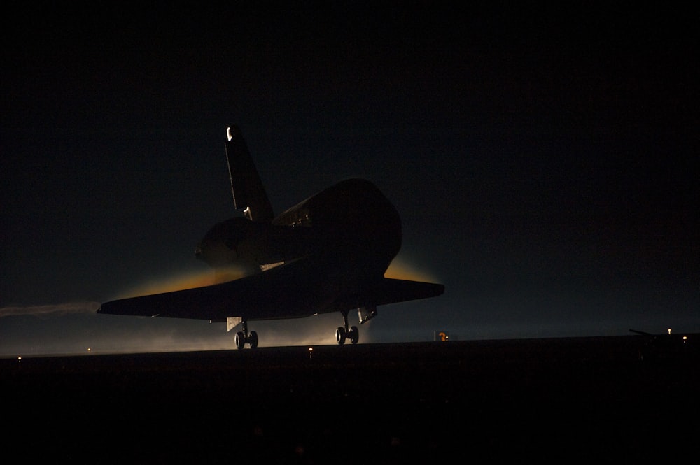 Space Shuttle Atlantis lands in the dark