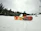 A customer skiing in Frostgear clothing on a mountain slope.