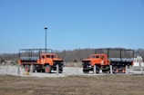 A small fleet of trucks equipped with tech devices ready for fast dispatch.