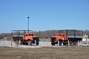 A small fleet of trucks equipped with tech devices ready for fast dispatch.
