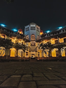 white and brown concrete building during nighttime