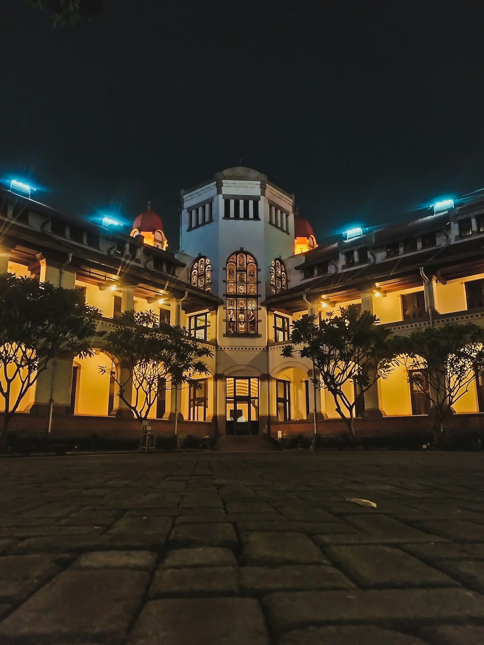 white and brown concrete building during nighttime