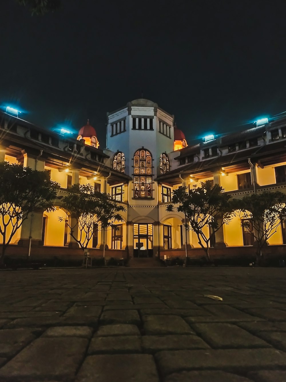 white and brown concrete building during nighttime