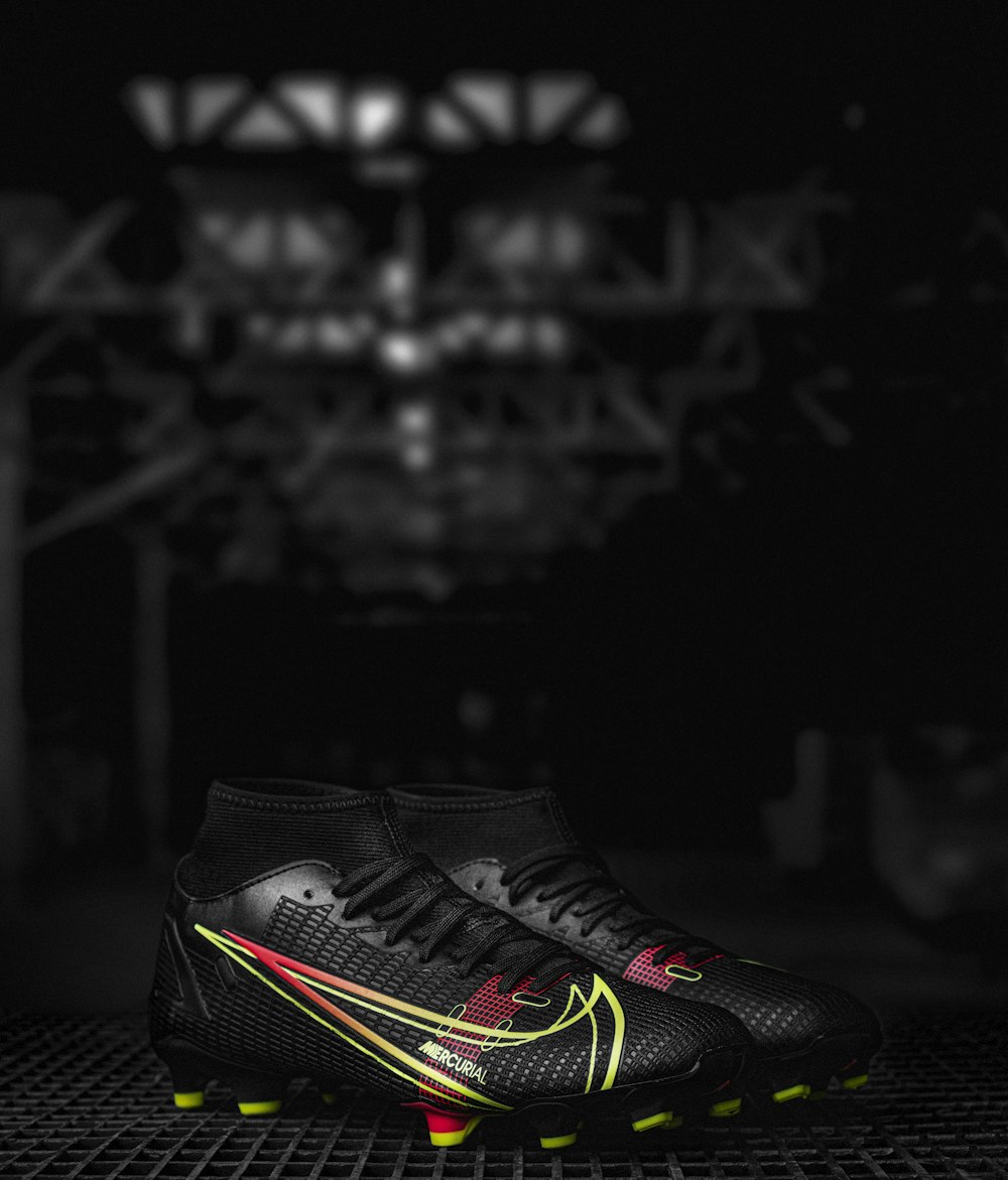 black and red nike athletic shoes photo – Free Football Image on Unsplash
