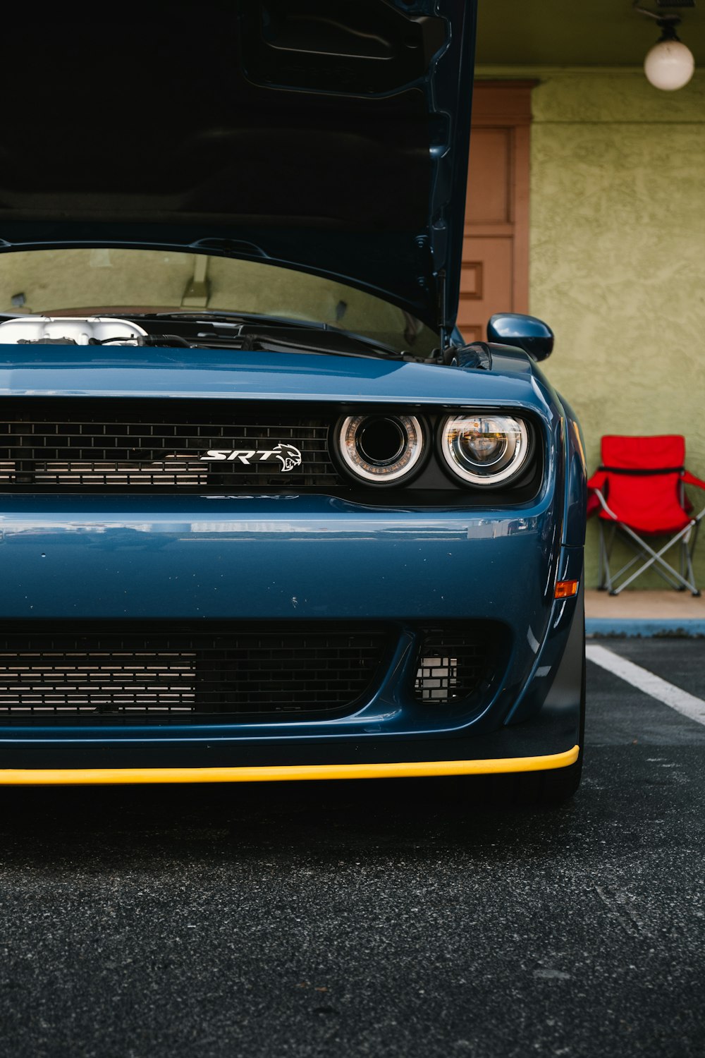 blue and yellow chevrolet camaro