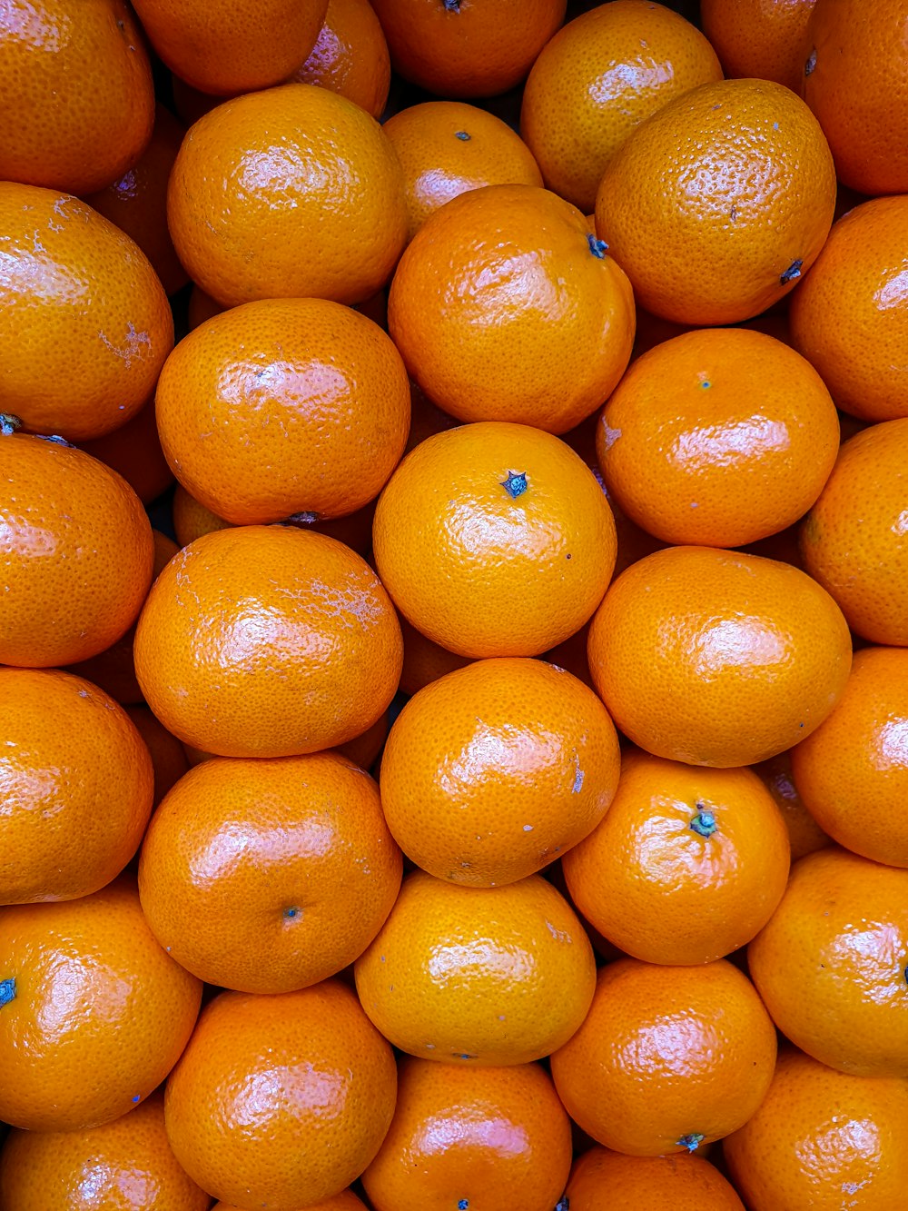 orange fruit on black surface