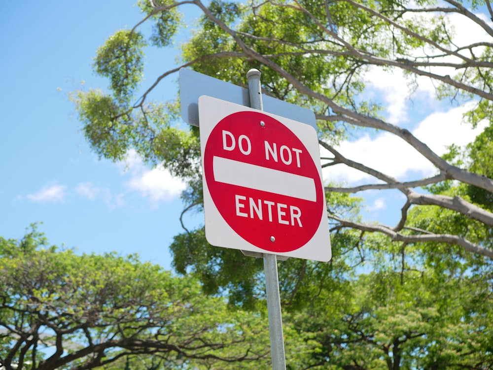 red and white stop road sign