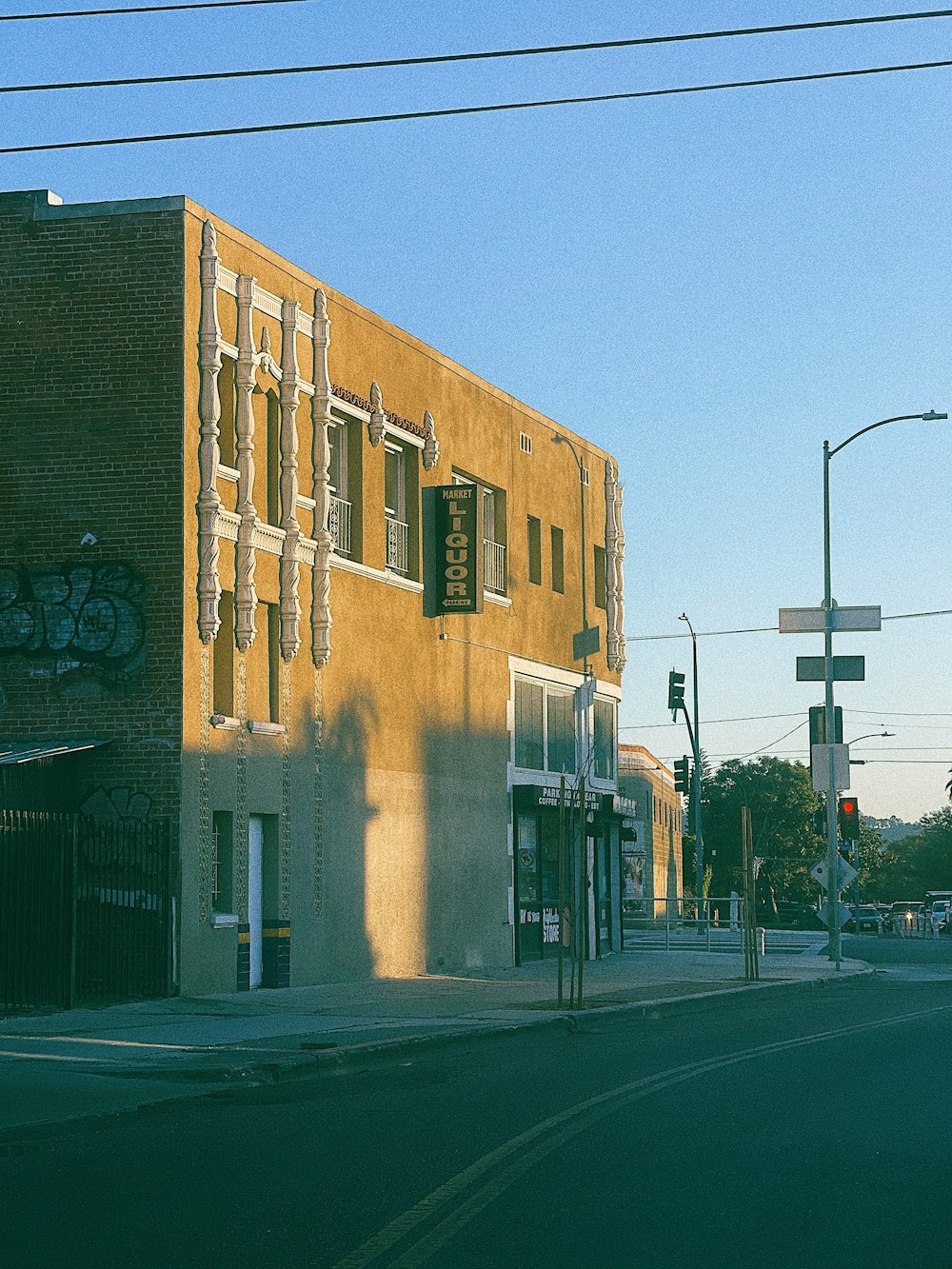 brown concrete building near road during daytime