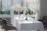 A warm, sunlit corner of the White Haven hall decorated for a joyful family gathering.