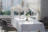 A warm, sunlit corner of the White Haven hall decorated for a joyful family gathering.