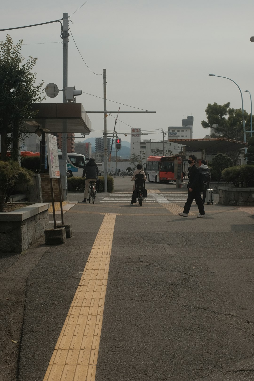 people walking on sidewalk during daytime