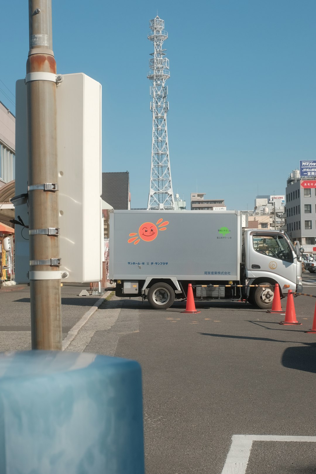 white and red truck on road during daytime