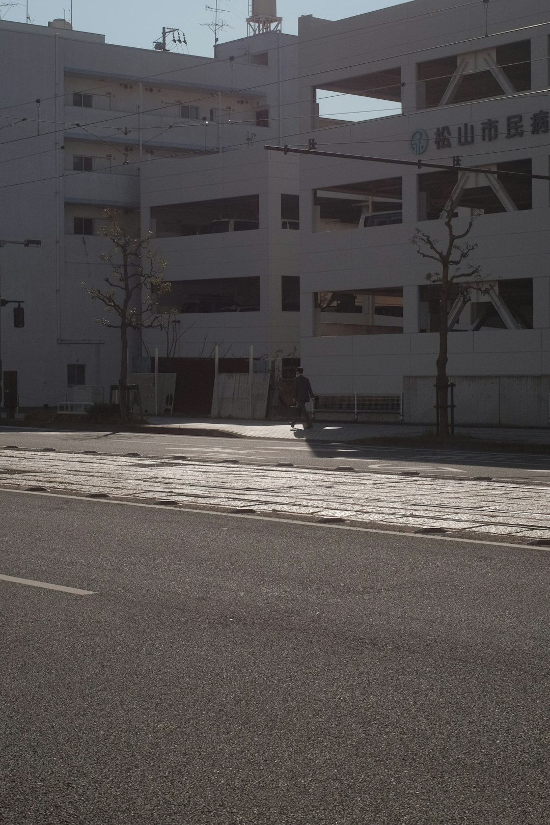 white concrete building near road during daytime