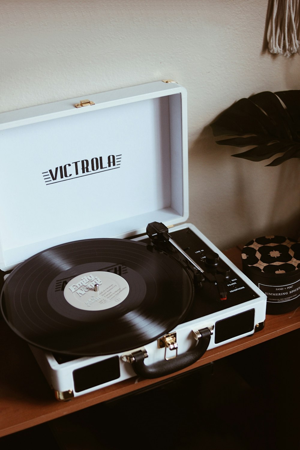 white and black vinyl record player