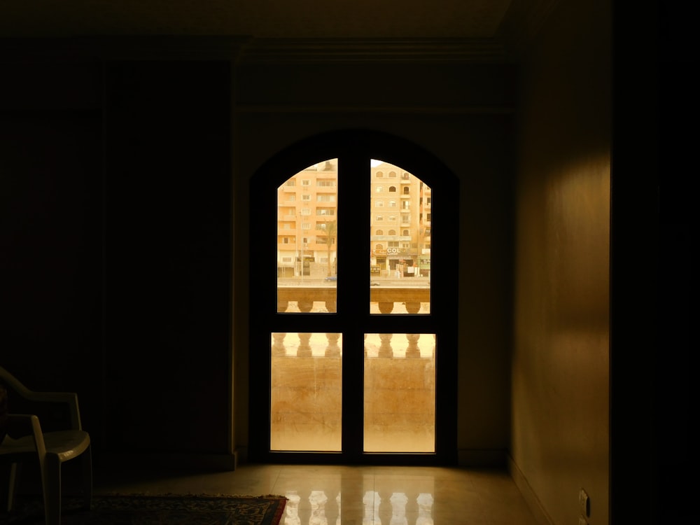 white and brown room with glass windows