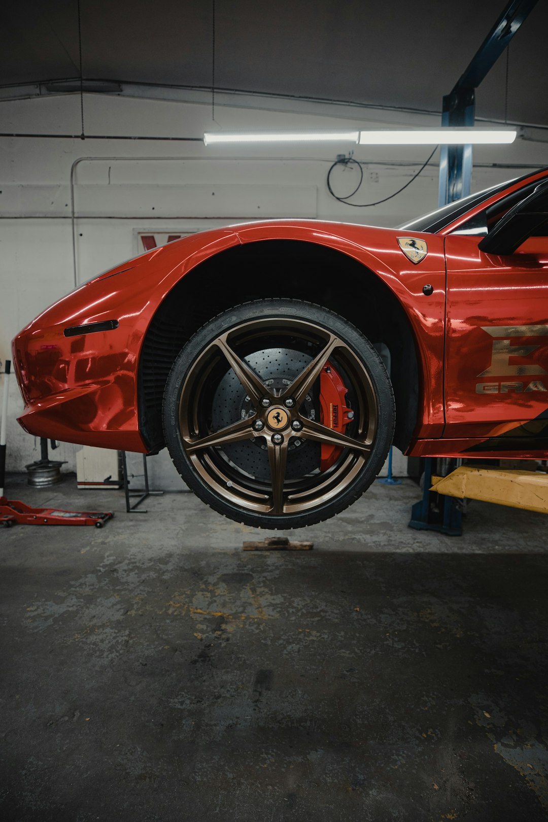 red car on brown wooden table